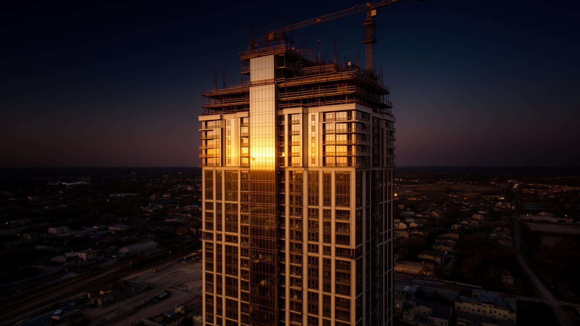 Luxury high-rise construction at dusk